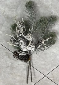Snowy pine branch with pine cones